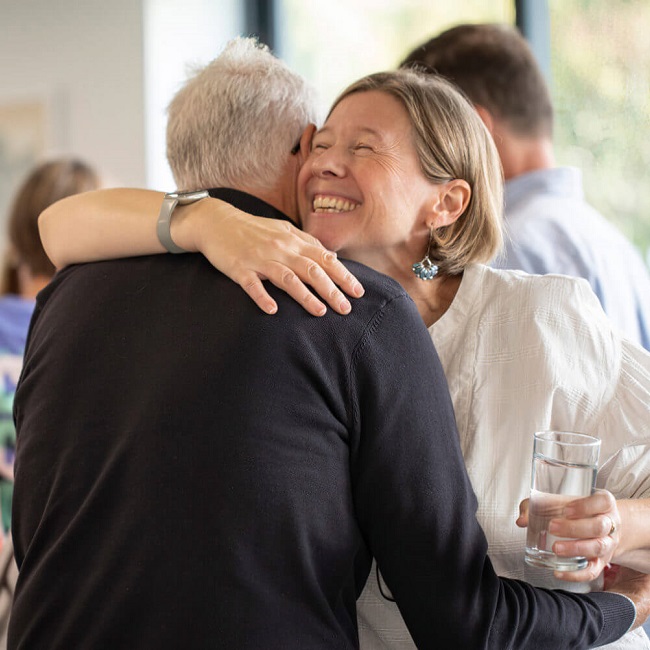 People hugging with joy